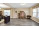 Expansive living space with modern flooring, large windows, and neutral walls, perfect for entertaining and relaxation at 2282 Creekland Dr, Columbus, IN 47201