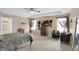 This bedroom is spacious with natural light from dual windows and features unique hat decor, adding personality at 2282 Creekland Dr, Columbus, IN 47201