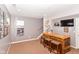 Finished basement featuring a stylish bar area complete with seating, ideal for entertaining guests at 3147 Bonham Dr, Indianapolis, IN 46222