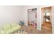 Carpeted playroom with toys and a door leading to an additional room at 3147 Bonham Dr, Indianapolis, IN 46222