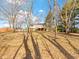 This home has a large backyard with mature trees and a walk-out basement with a deck at 321 Pleasantview Dr, Greenwood, IN 46142