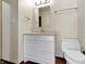 Bright bathroom with white vanity and toilet at 321 Pleasantview Dr, Greenwood, IN 46142