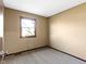 Bedroom featuring neutral walls, plush carpet, and natural light from a window at 321 Pleasantview Dr, Greenwood, IN 46142