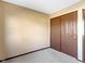 Bedroom with neutral walls, carpet, and a closet, providing a comfortable space at 321 Pleasantview Dr, Greenwood, IN 46142