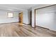Spacious bedroom with ample closet space and wood-look flooring at 321 Pleasantview Dr, Greenwood, IN 46142