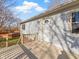 This home boasts a large deck with access to the home's side entry door at 321 Pleasantview Dr, Greenwood, IN 46142