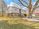 Charming home with manicured front lawn, lovely landscaping, and mature trees at 321 Pleasantview Dr, Greenwood, IN 46142