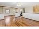 Open-concept living space with hardwood floors, a ceiling fan, and natural light at 321 Pleasantview Dr, Greenwood, IN 46142
