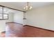 This living room has hardwood floors and an adjacent dining area at 321 Pleasantview Dr, Greenwood, IN 46142