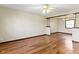 This open-concept living room has hardwood floors and natural light at 321 Pleasantview Dr, Greenwood, IN 46142