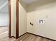 Room featuring wood-look flooring and water hookups at 321 Pleasantview Dr, Greenwood, IN 46142