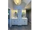 Dual sink vanity bathroom with updated fixtures and ample cabinet space at 3610 Eagle Emblem Ct, Greenwood, IN 46143