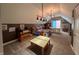 Charming bedroom with sloped ceilings, quirky light fixtures, colorful quilt, and cozy carpet at 3610 Eagle Emblem Ct, Greenwood, IN 46143