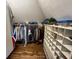 Organized walk-in closet with custom shelving, hanging rods, and ample storage at 3610 Eagle Emblem Ct, Greenwood, IN 46143