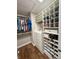 Walk-in closet with custom organizers, shelves, shoe racks, and hanging space at 3610 Eagle Emblem Ct, Greenwood, IN 46143