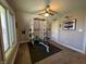Bright exercise room features free weights, weight bench, ceiling fan, and gray walls at 3610 Eagle Emblem Ct, Greenwood, IN 46143