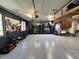 Well-organized garage features sealed flooring, storage cabinets, and pegboard wall at 3610 Eagle Emblem Ct, Greenwood, IN 46143