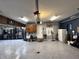 Spacious garage featuring storage cabinets, white walls, and a sealed speckled floor at 3610 Eagle Emblem Ct, Greenwood, IN 46143