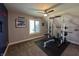 Home gym featuring weightlifting equipment, natural light, and a ceiling fan at 3610 Eagle Emblem Ct, Greenwood, IN 46143