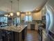 Open kitchen with a center island, modern appliances, and ample cabinet space at 3610 Eagle Emblem Ct, Greenwood, IN 46143