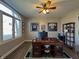 Inviting office with sports memorabilia, large window, and stylish decor at 3610 Eagle Emblem Ct, Greenwood, IN 46143