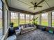 Cozy sun room with lots of natural light, comfortable furniture, and plants for a relaxing atmosphere at 3610 Eagle Emblem Ct, Greenwood, IN 46143