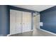 A spacious bedroom featuring a closet and a view into the bathroom at 3661 Yellow Poplar Ct, Indianapolis, IN 46222