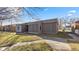Charming single-story home with gray siding, well-maintained lawn, and a concrete walkway at 3661 Yellow Poplar Ct, Indianapolis, IN 46222