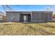 Charming single-story home with gray siding, front lawn, and a welcoming front door at 3661 Yellow Poplar Ct, Indianapolis, IN 46222