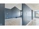 An open living space featuring tile floors, bright and neutral paint, and great natural light at 3661 Yellow Poplar Ct, Indianapolis, IN 46222