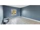 A room with a view from the window and neutral tile floors at 3661 Yellow Poplar Ct, Indianapolis, IN 46222