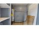 A utility room featuring a water heater and tile floors at 3661 Yellow Poplar Ct, Indianapolis, IN 46222