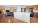 Open kitchen with wood cabinets, stainless steel appliances, open to the living room at 380 Winterset Way, Greenwood, IN 46143