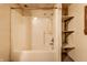 Bathroom boasts a white shower with built in storage at 4355 W 450 S, Columbus, IN 47201