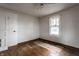 Bedroom with hardwood floor, window and doorway at 4355 W 450 S, Columbus, IN 47201