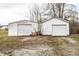 Exterior of this home features a large two-car garage at 4355 W 450 S, Columbus, IN 47201