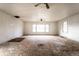 Spacious living room featuring hardwood floor and two windows at 4355 W 450 S, Columbus, IN 47201