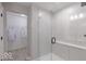 Bright bathroom with a glass shower at 4738 E Shadowbrook Dr, Camby, IN 46113