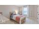 Charming bedroom featuring a twin-size bed, soft natural light, and playful decor at 4738 E Shadowbrook Dr, Camby, IN 46113