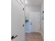 Bright entryway with white door, hardwood floors and neutral paint at 4738 E Shadowbrook Dr, Camby, IN 46113