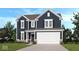 Charming two-story home featuring a two-car garage, dark siding and well manicured lawn and landscape at 4738 E Shadowbrook Dr, Camby, IN 46113
