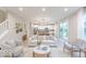 Elegant living room boasts an open concept with lots of natural light and stylish, neutral decor at 4738 E Shadowbrook Dr, Camby, IN 46113