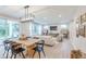 Expansive living area with an open floor plan, large windows, and seamless transition to outdoor living spaces at 4738 E Shadowbrook Dr, Camby, IN 46113