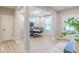 Office featuring a door to the outside, a large window and a small table and rolling chairs at 4738 E Shadowbrook Dr, Camby, IN 46113