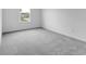 This bedroom features a window with neutral paint and carpeting at 4739 E Shadowbrook Dr, Camby, IN 46113