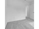 Neutral carpeting in a bedroom with a door and neutral paint at 4739 E Shadowbrook Dr, Camby, IN 46113