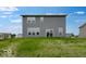 Back exterior elevation of home with horizontal siding and green yard at 4739 E Shadowbrook Dr, Camby, IN 46113
