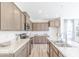Contemporary kitchen with stainless steel appliances, ample cabinet space, and a view to dining area at 4739 E Shadowbrook Dr, Camby, IN 46113
