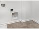 Laundry room with tile floor and appliances and dryer hookups at 4739 E Shadowbrook Dr, Camby, IN 46113