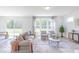 Spacious living room with a sliding glass door and neutral decor at 4739 E Shadowbrook Dr, Camby, IN 46113
